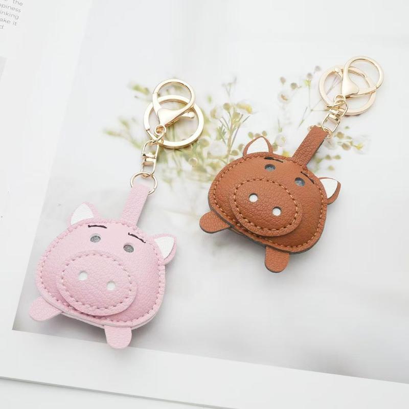 سلسلة مفاتيح جلدية على شكل خنز - مراجعة Mini Backpack Purse وسعره