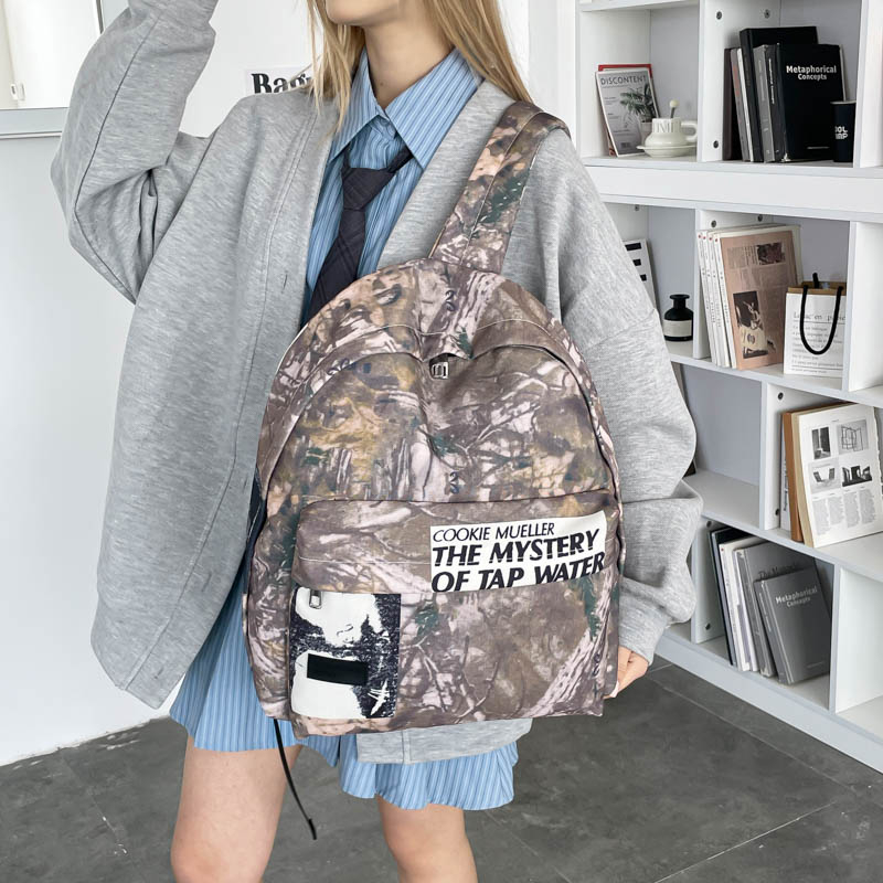 للجنسين ريترو التمويه نمط حقيب - مراجعة Canvas Backpack Casual وسعره